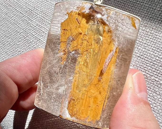 Specialty Enhydro - Rare combo, quartz rock crystal with a large moving bubble and orange sand - ID A0353