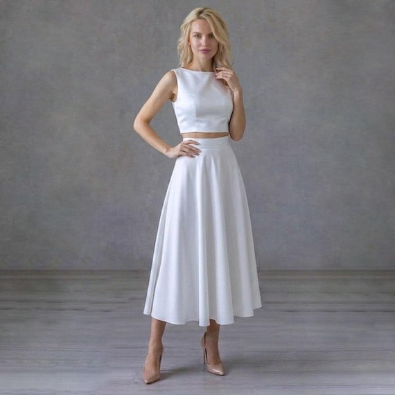 Elegant White Two-Piece Suit: Bridal Outfit of Midi Skirt and Sleeveless Crop Top