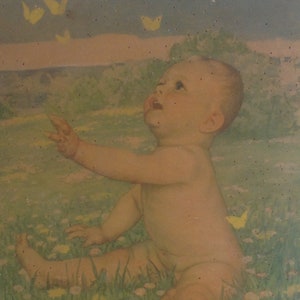 Large old chromo of baby and butterflies glued on wood