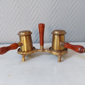 Salt and pepper condiment set in wood and brass