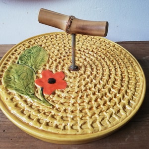 Presentation tray, cheeses, cakes, in yellow slip with orange flower, Vallauris style