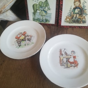 2 children&#39;s plates Tales of Perrault L&#39;Amandinoise