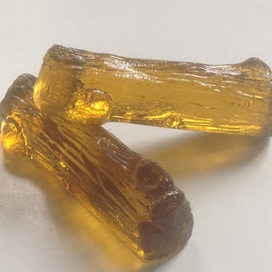 10 smoked glass knife holders in the shape of logs from the 70s