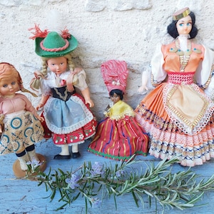 Batch of miniature folk celluloid dolls