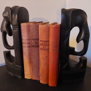 Pair of ebony elephant bookends