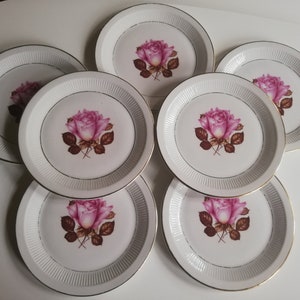 7 dessert plates in porcelain Orchies Moulin des Loups pink décor