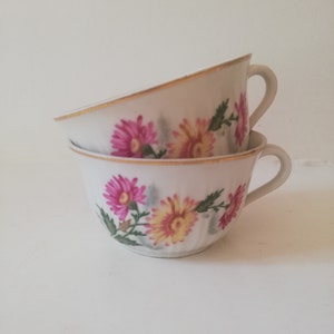 Duo of Limoges porcelain coffee cups daisy pattern
