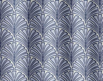 May include: A seamless pattern featuring a repeating design of blue and white stylised fan shapes. The pattern is reminiscent of Art Deco style.