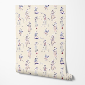 May include: Wallpaper roll featuring a repeating pattern of vintage illustrations of people playing golf. The figures are dressed in retro attire, with red, blue, and beige tones. The wallpaper has a cream-colored background.