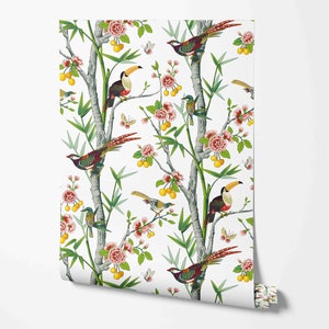 May include: White wallpaper with a repeating pattern of pink flowers, green leaves, yellow fruit, and colourful birds. The birds include toucans, pheasants, and smaller birds.