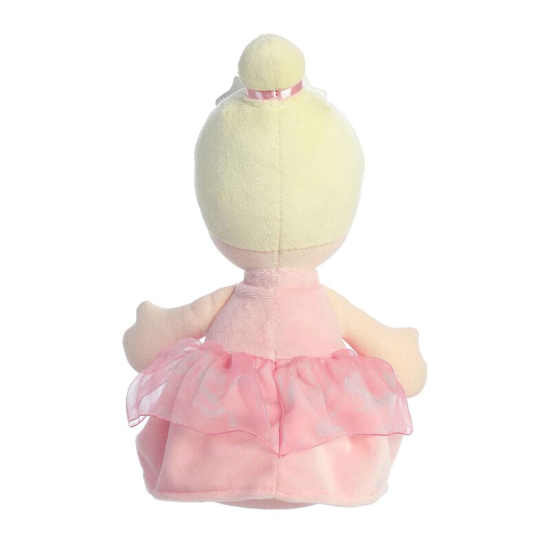 May include: A plush ballerina doll with blonde hair and a pink tutu. The doll is sitting with its legs crossed and its arms at its sides.