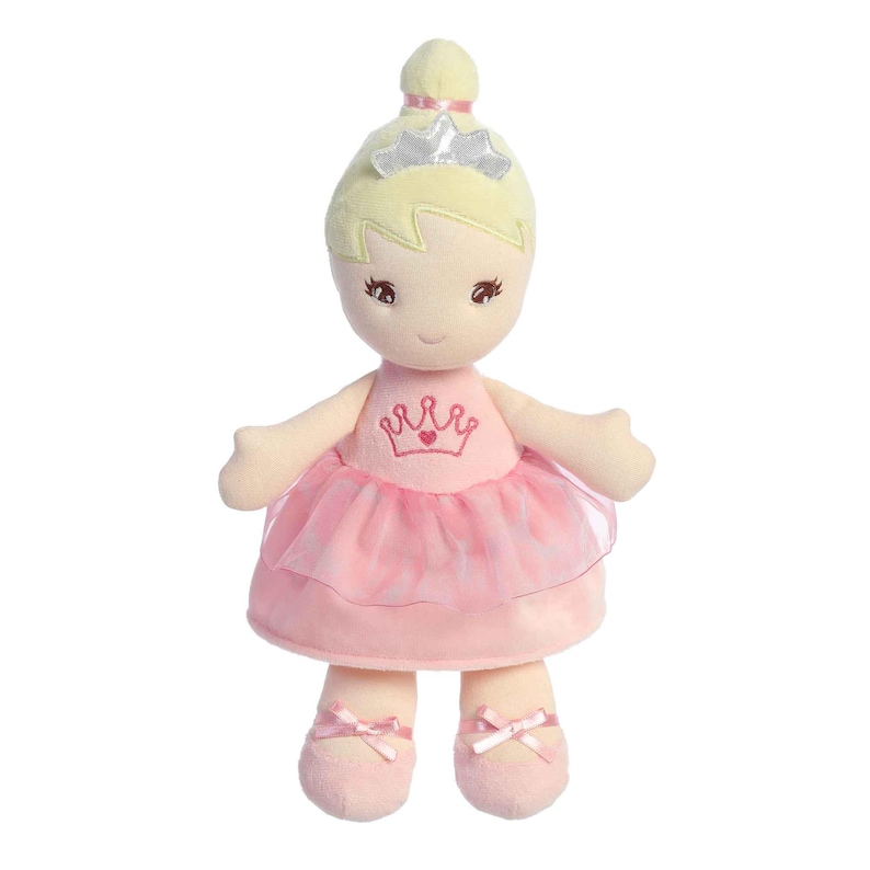 May include: A plush doll dressed as a ballerina with a pink tutu and a crown on her head. She has blonde hair and brown eyes.