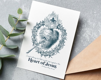 May include: A white card with a blue illustration of a heart pierced by an arrow and surrounded by a crown of thorns. The text on the card reads "I need nothing but God and to lose myself in the Heart of Jesus - St. Margaret Mary Alacoque."