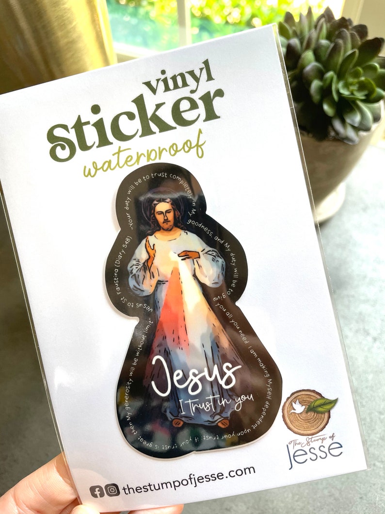 May include: A waterproof vinyl sticker featuring a painting of Jesus with the words "Jesus I trust in you" and a quote from Saint Faustina. The sticker is on a white background with a green and white logo that says "The Stump of Jesse".