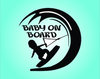 May include: A black and white graphic of a baby wakeboarding, with the text "BABY ON BOARD" in a stylized font. The design features a baby silhouette on a surfboard, with a wave and a wakeboarding rope. The background is a light teal color.