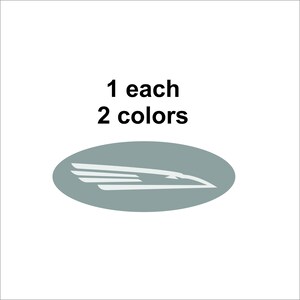 May include: A gray oval sticker with a white stylized eagle design. The sticker says "1 each 2 colors".