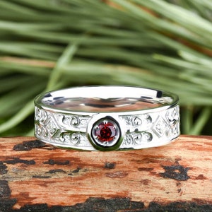 Red garnet gemstone ring in vintage antique style personalized with a custom engrave: January birthstone ring as a wedding band for women
