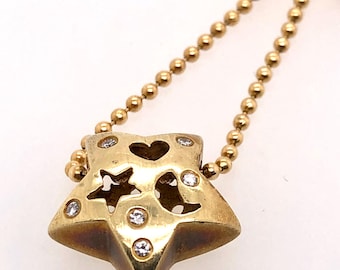 vinatge star diamond pendent in 14k gold