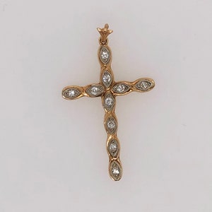 14k Vintage diamond cross.