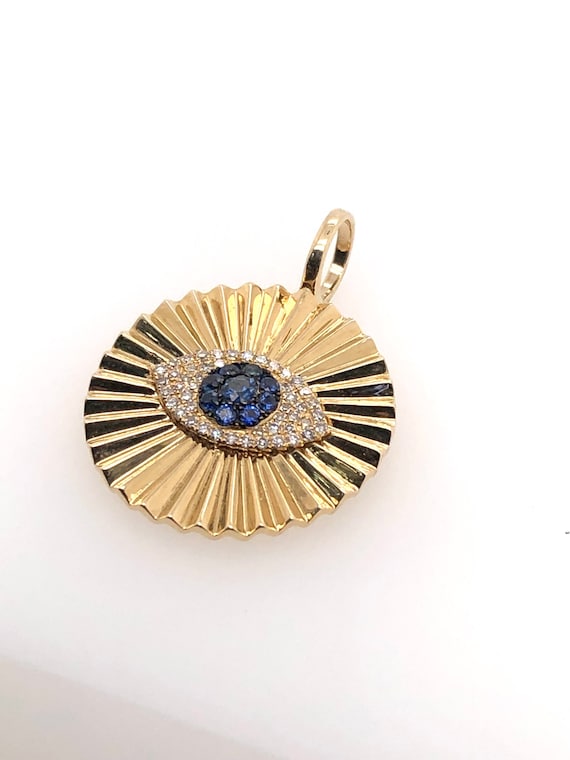 Evil eye pendent with genuine diamonds and sapphires