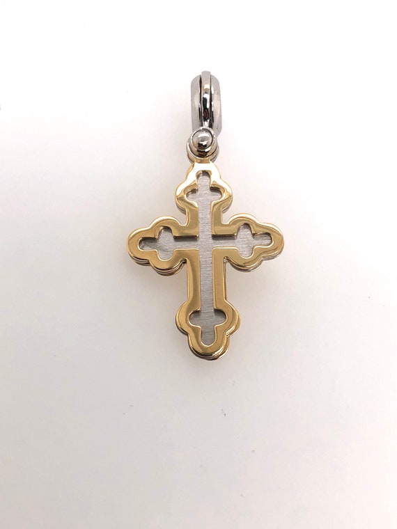 vintage articulating Italian cross in 14k gold