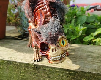 Undead cat zombie feline. Gothic Halloween horror decor fun. This living dead pet makes a great companion and familiar for around the home.