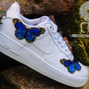 nike with blue butterflies