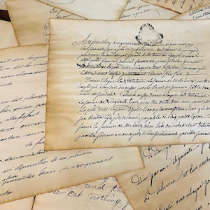 May include: A collection of aged, handwritten letters and documents, with faded ink and aged paper. The script is elegant and flowing, with visible ink blots and imperfections. The papers are arranged in a layered composition, suggesting a historical or vintage theme.
