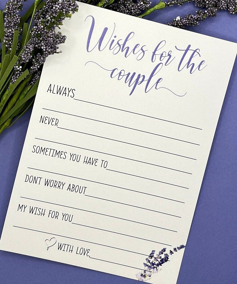 May include: A white card with black lines and purple text that reads 'Wishes for the couple'. The card has prompts for writing wishes for a couple, including 'Always', 'Never', 'Sometimes you have to', 'Don't worry about', and 'My wish for you'. The card also has a small heart with the text 'With love'.