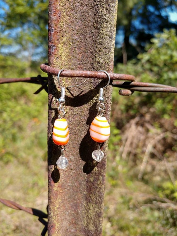 Orange and white dangle earrings | Etsy