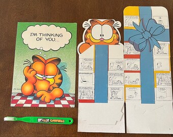 Garfield the cat, gift box, card, and toothbrush.1976.