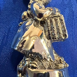 Miniature silver bell with a sweet little female bear handle