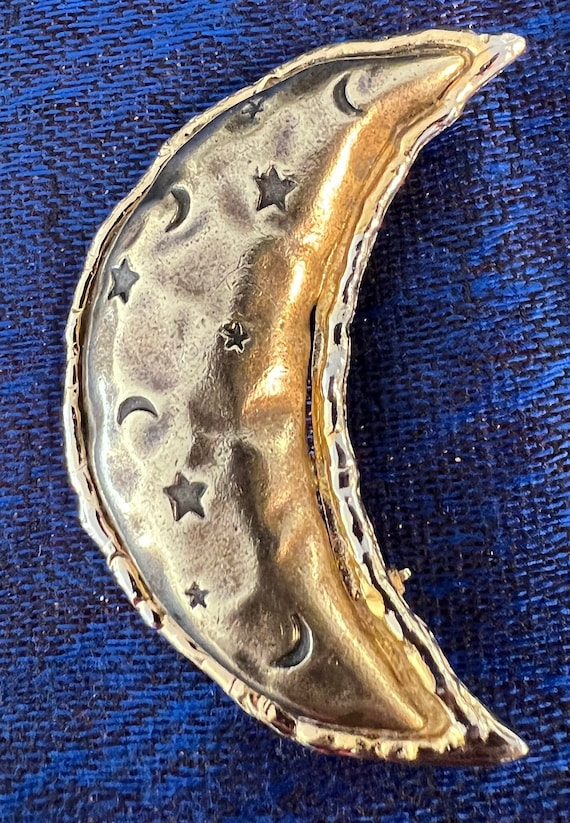 Graceful vintage gold half moon brooch