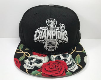 NHL Los Angeles Kings Champions Snapback: Rose Skulls