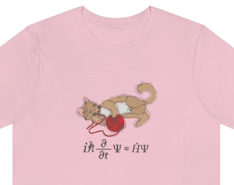 May include: A pink t-shirt featuring a cartoon cat holding a ball of yarn. The shirt has the equation "ih d/dt = H^" printed below the cat.