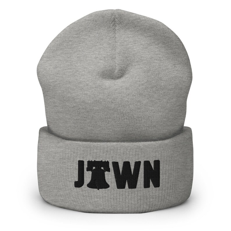 May include: Gray beanie with a black embroidered Liberty Bell and the word "JTOWN" on the cuff.