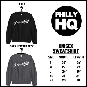 May include: Black and dark heather grey unisex sweatshirts with the word "Philadelphia" in white script. The image also includes a black circle with "PHILLY HQ" in white, and a size chart with measurements in inches.