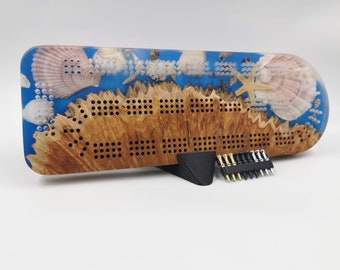 Amazing Ocean Cribbage Board - 3 Track Live edge brown mallee burl and sea shells over blue epoxy resin