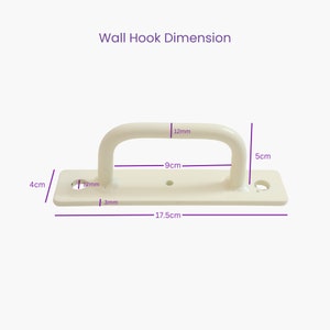May include: White metal wall hook with a 9cm wide opening and a 5cm tall hook. The hook is 17.5cm wide and 4cm tall. The hook has two holes for mounting.