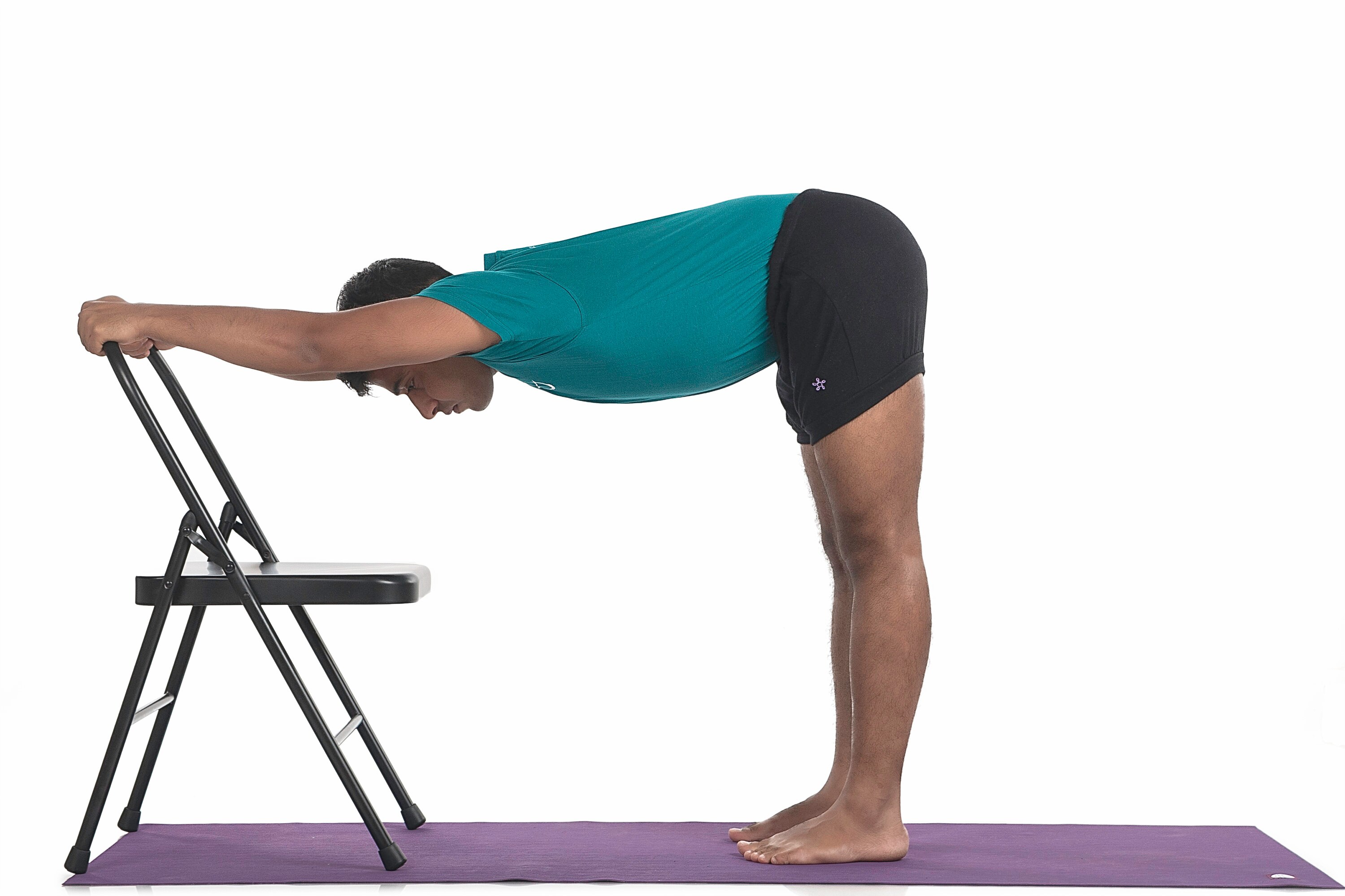 5 Yoga Poses You Can Do From the Comfort of Your Chair - DoYou