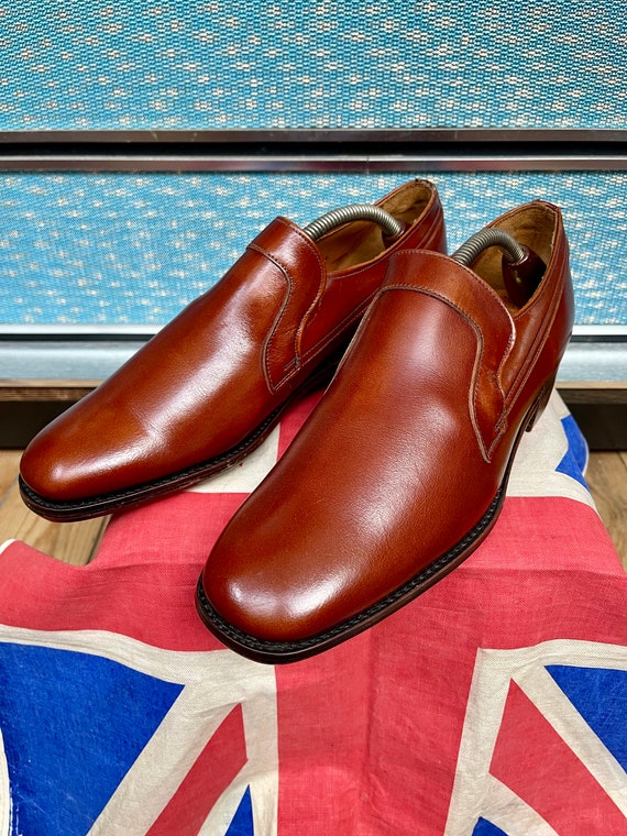 Loake, Vintage deadstock early 1970s 70’s Loake leather conker brown all leather slip on Loafer shoes.Sartorial elegance.Size 6.5 UK UNWORN