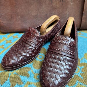 Vintage 1980s maybe very late 70s wine burgundy coloured full basket weave slip on loafers shoes,made in Mallorca.Size 8 to 8.5