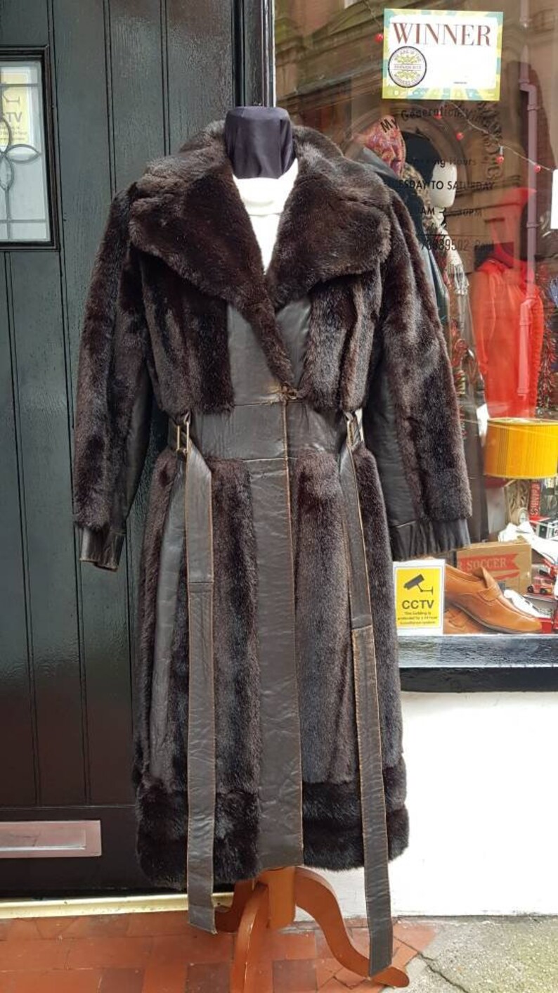 Simulated fur very funky.Small 8-10 Vintage late 1960s 70/'s Astraka belted leather faux fur long winter coat