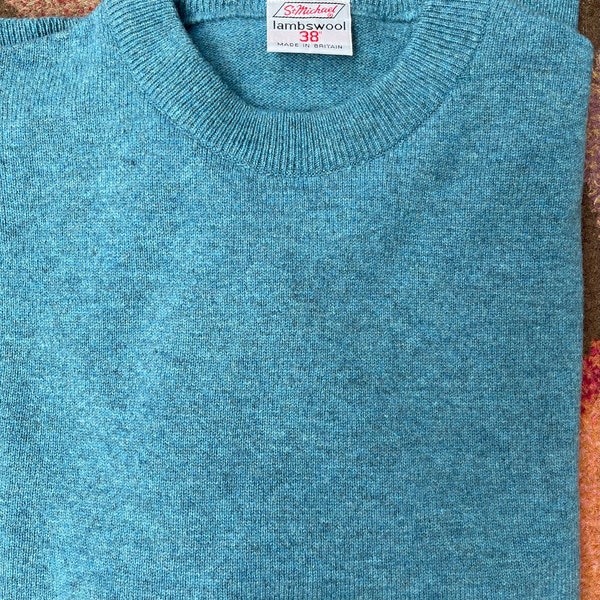 Mint Vintage late 1970s early 80’s St.Michael deadstock lambswool crew neck in Aegean blue.Small to 39”chest.