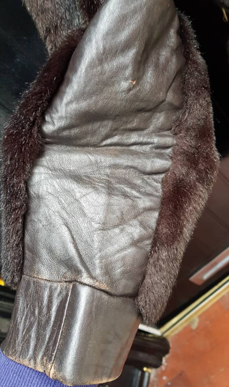 Simulated fur very funky.Small 8-10 Vintage late 1960s 70/'s Astraka belted leather faux fur long winter coat