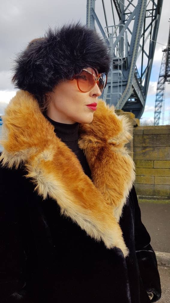 Astraka coat hotsell