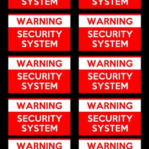 May include: A series of red and white warning labels, each displaying the text "WARNING SECURITY SYSTEM". The labels are rectangular and set against a black backdrop, with clear, bold lettering.