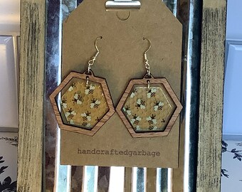 Hexagon and circle dangle bee earring.  Wood and acrylic earring. Laser cut and engraved.