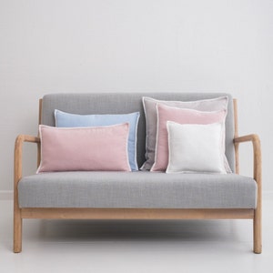 Linen Pillow Cover. Washed linen pillowcase with pom-poms. Stylishe custom size linen pillow for living room.