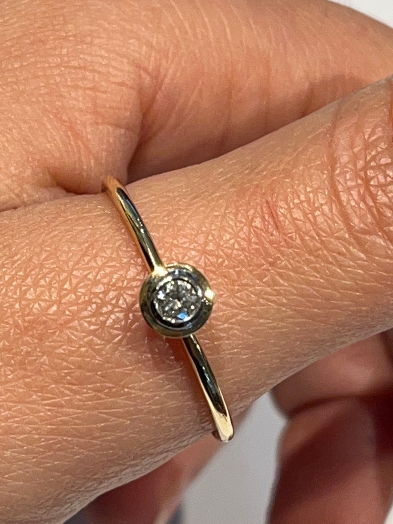 Yellow gold ring 750, with setting plate 960 with diamond 0.10 image 3